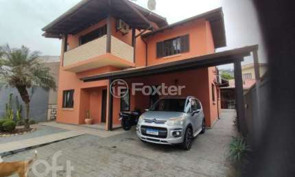 Casa com 4 quartos à venda na Rua Frei Albano, 64, Centro, São José, 143 m2 por R$ 1.250.000