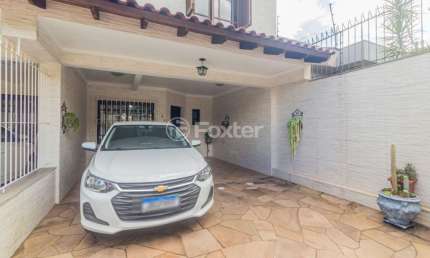 Casa com 3 quartos à venda na Rua Leopoldo Bettiol, 146, Jardim Itu Sabará, Porto Alegre, 104 m2 por R$ 550.000