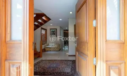 Casa em condomínio fechado com 3 quartos à venda na avenida juca batista, 8000, belém novo, porto alegre, 294 m2 por r$ 1.300.000