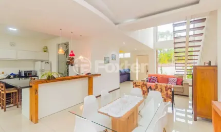 Casa em condomínio fechado com 3 quartos à venda na avenida juca batista, 2705, hípica, porto alegre, 272 m2 por r$ 750.000