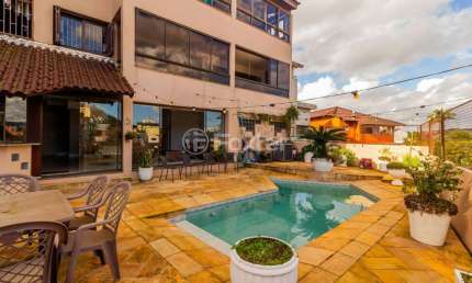 Casa com 4 quartos à venda na Rua Luiz Voelcker, 351, Três Figueiras, Porto Alegre, 350 m2 por R$ 1.650.000