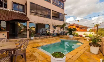 Casa com 4 quartos à venda na Rua Luiz Voelcker, 351, Três Figueiras, Porto Alegre, 350 m2 por R$ 1.650.000
