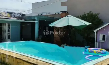 Casa com 3 quartos à venda na Avenida Boqueirão, 1734, Igara, Canoas, 119 m2 por R$ 1.063.900