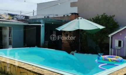Casa com 3 quartos à venda na Avenida Boqueirão, 1734, Igara, Canoas, 119 m2 por R$ 1.063.900