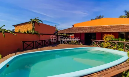 Casa com 3 quartos à venda na Rua Santa Mônica, 375, Ponta Grossa, Porto Alegre, 293 m2 por R$ 700.000