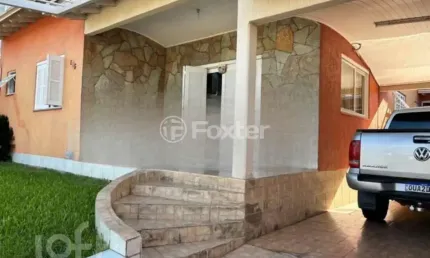 Casa com 3 quartos à venda na Avenida João Marciano, 105, Girassol, Gravataí, 130 m2 por R$ 585.000