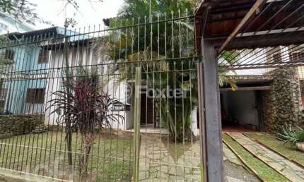 Casa com 4 quartos à venda na Rua São Caetano, 101, Marechal Rondon, Canoas, 360 m2 por R$ 1.000.000