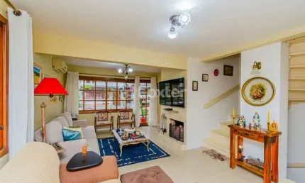 Casa em condomínio fechado com 3 quartos à venda na Rua General Rondon, 1259, Tristeza, Porto Alegre, 185 m2 por R$ 890.000