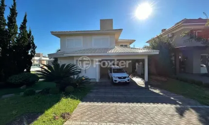 Casa em condomínio fechado com 3 quartos à venda na Avenida Senador Salgado Filho, 8500, Querência, Viamão, 459 m2 por R$ 1.690.000