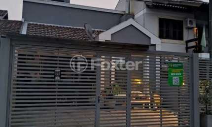 Casa com 2 quartos à venda na Rua Baldoino Bottini, 471, Hípica, Porto Alegre, 140 m2 por R$ 450.000