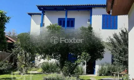 Casa com 3 quartos à venda na Rua Jacipuia, 317, Guarujá, Porto Alegre, 271 m2 por R$ 721.000