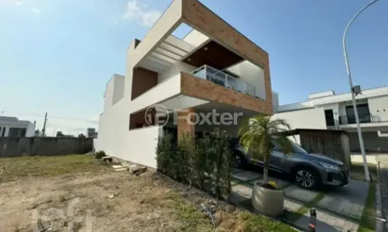 Casa em condomínio fechado com 3 quartos à venda na Avenida Deltaville, 150, Beira Rio, Biguaçu, 192 m2 por R$ 1.282.500
