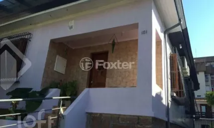 Casa com 5 quartos à venda na rua guilherme schell, 161, santo antônio, porto alegre, 396 m2 por r$ 950.000