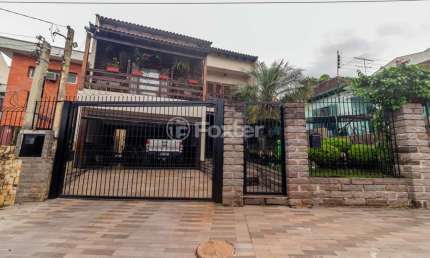 Casa com 4 quartos à venda na Rua Lindolfo Color, 95, Medianeira, Porto Alegre, 350 m2 por R$ 1.200.000