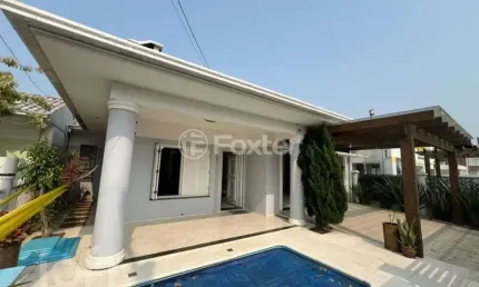 Casa com 3 quartos à venda na Avenida Flávio Boianovski, 918, Centro, Capão da Canoa, 172 m2 por R$ 1.280.000