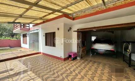 Casa com 3 quartos à venda na Estrada Presidente Lucena, 3132, Primavera, Novo Hamburgo, 282 m2 por R$ 395.000