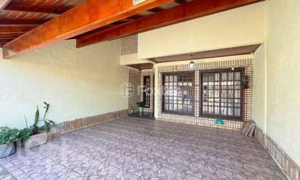 Casa com 4 quartos à venda na Rua Doutor Egydio Michaelsen, 58, Cavalhada, Porto Alegre, 202 m2 por R$ 655.000