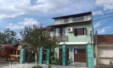 Casa com 5 quartos à venda na Rua Doutor Telmo Vergara, 554, Partenon, Porto Alegre, 331 m2 por R$ 1.199.000