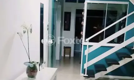 Casa em condomínio fechado com 3 quartos à venda na Avenida Juca Batista, 1490, Cavalhada, Porto Alegre, 122 m2 por R$ 555.000