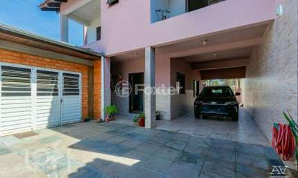 Casa com 5 quartos à venda na Rua das Camélias, 69, Igara, Canoas, 520 m2 por R$ 1.400.000