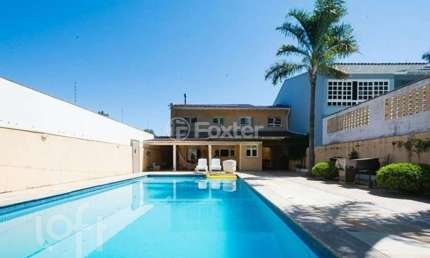 Casa com 4 quartos à venda na Avenida Saul Nonnenmacher, 112, Ipanema, Porto Alegre, 452 m2 por R$ 1.350.000
