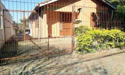 Casa com 3 quartos à venda na Rua São Mateus, 218, Jardim do Salso, Porto Alegre, 325 m2 por R$ 655.000