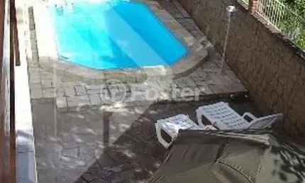 Casa com 3 quartos à venda na Rua Liberal, 97, Tristeza, Porto Alegre, 320 m2 por R$ 1.390.000