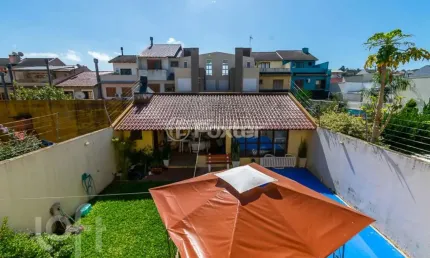 Casa com 5 quartos à venda na rua moacyr godoy ilha, 242, espírito santo, porto alegre, 360 m2 por r$ 649.900