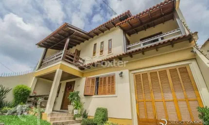Casa com 5 quartos à venda na Avenida José Corrêa da Silva, 117, Cavalhada, Porto Alegre, 316 m2 por R$ 720.000
