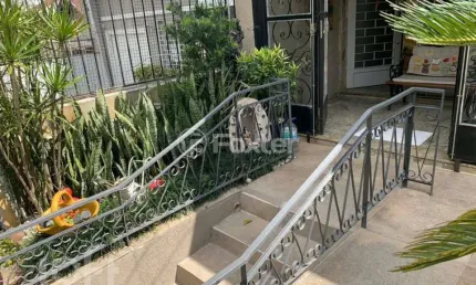 Casa com 4 quartos à venda na travessa miguel pereira, 104, medianeira, porto alegre, 250 m2 por r$ 980.000