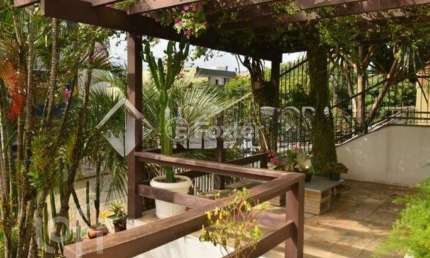 Casa com 4 quartos à venda na Rua Doutor Jorge Fayet, 501, Chácara das Pedras, Porto Alegre, 223 m2 por R$ 1.600.000