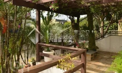Casa com 4 quartos à venda na Rua Doutor Jorge Fayet, 501, Chácara das Pedras, Porto Alegre, 223 m2 por R$ 1.600.000