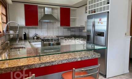 Casa com 4 quartos à venda na Rua Ararás, 344, Sarandi, Porto Alegre, 292 m2 por R$ 1.200.000