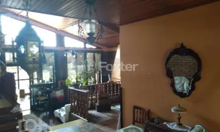 Casa com 3 quartos à venda na Avenida Martim Félix Berta, 2960, Mário Quintana, Porto Alegre, 163 m2 por R$ 790.000