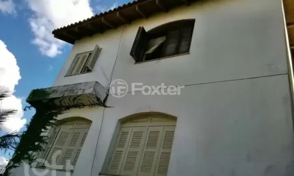 Casa com 2 quartos à venda na Rua Martim Minaberry, 432, Partenon, Porto Alegre, 250 m2 por R$ 478.000