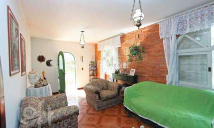 Casa com 3 quartos à venda na Rua Morretes, 120, Santa Maria Goretti, Porto Alegre, 204 m2 por R$ 890.000