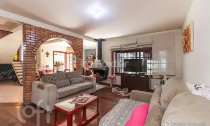 Casa com 3 quartos à venda na Avenida América, 268, Auxiliadora, Porto Alegre, 262 m2 por R$ 1.400.000