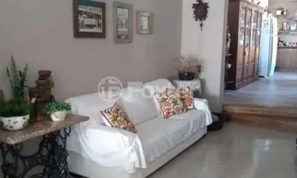 Casa com 3 quartos à venda na Rua Jayme Saul de Borba, 40, Espírito Santo, Porto Alegre, 107 m2 por R$ 720.000