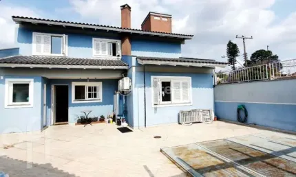 Casa com 4 quartos à venda na Rua Doutor Paulino Guerra, 505, Jardim Itu Sabará, Porto Alegre, 167 m2 por R$ 650.000