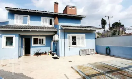 Casa com 4 quartos à venda na Rua Doutor Paulino Guerra, 505, Jardim Itu Sabará, Porto Alegre, 167 m2 por R$ 650.000