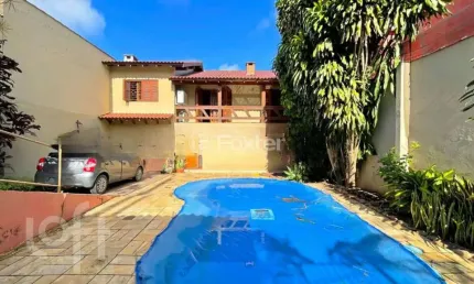 Casa com 4 quartos à venda na Rua Francisca Lechner, 343, Parque Santa Fé, Porto Alegre, 263 m2 por R$ 650.000