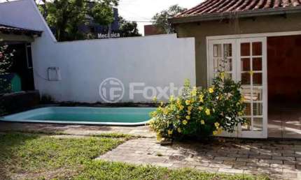 Casa em condomínio fechado com 3 quartos à venda na Avenida Juca Batista, 4115, Hípica, Porto Alegre, 190 m2 por R$ 499.000
