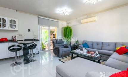 Casa com 3 quartos à venda na Rua Jerolomo Minuzo, 107, Vila Nova, Porto Alegre, 268 m2 por R$ 1.100.000