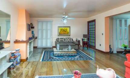Casa com 2 quartos à venda na Rua Teixeira de Freitas, 911, Santo Antônio, Porto Alegre, 350 m2 por R$ 1.045.000