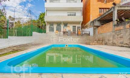 Casa com 4 quartos à venda na Praça São Caetano, 82, Teresópolis, Porto Alegre, 454 m2 por R$ 1.510.500