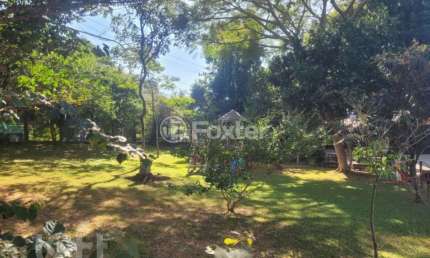 Casa em condomínio fechado com 4 quartos à venda na Rodovia Doutor Antônio Luiz Moura Gonzaga, 383, Rio Tavares, Florianópolis, 200 m2 por R$ 2.950.000