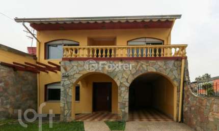 Casa com 3 quartos à venda na Rua Santa Maria, 554, Nossa Senhora das Graças, Canoas, 355 m2 por R$ 980.000