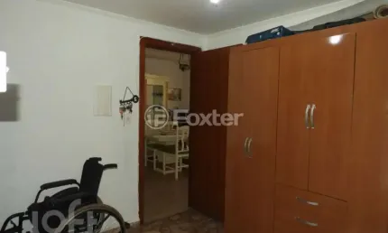 Casa com 3 quartos à venda na Rua Márcio Dias, 176, Nonoai, Porto Alegre, 317 m2 por R$ 780.000
