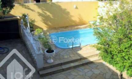 Casa com 3 quartos à venda na Rua Olécio Cavedini, 165, Espírito Santo, Porto Alegre, 200 m2 por R$ 800.000