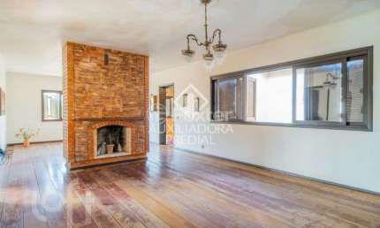 Casa com 3 quartos à venda na Avenida Clemenciano Barnasque, 219, Teresópolis, Porto Alegre, 400 m2 por R$ 990.000